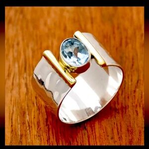 Silver ring size 7 with gold detail and blue faux stone  just beautiful
